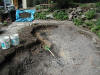 Note the pile of top soil on the blue tarp
